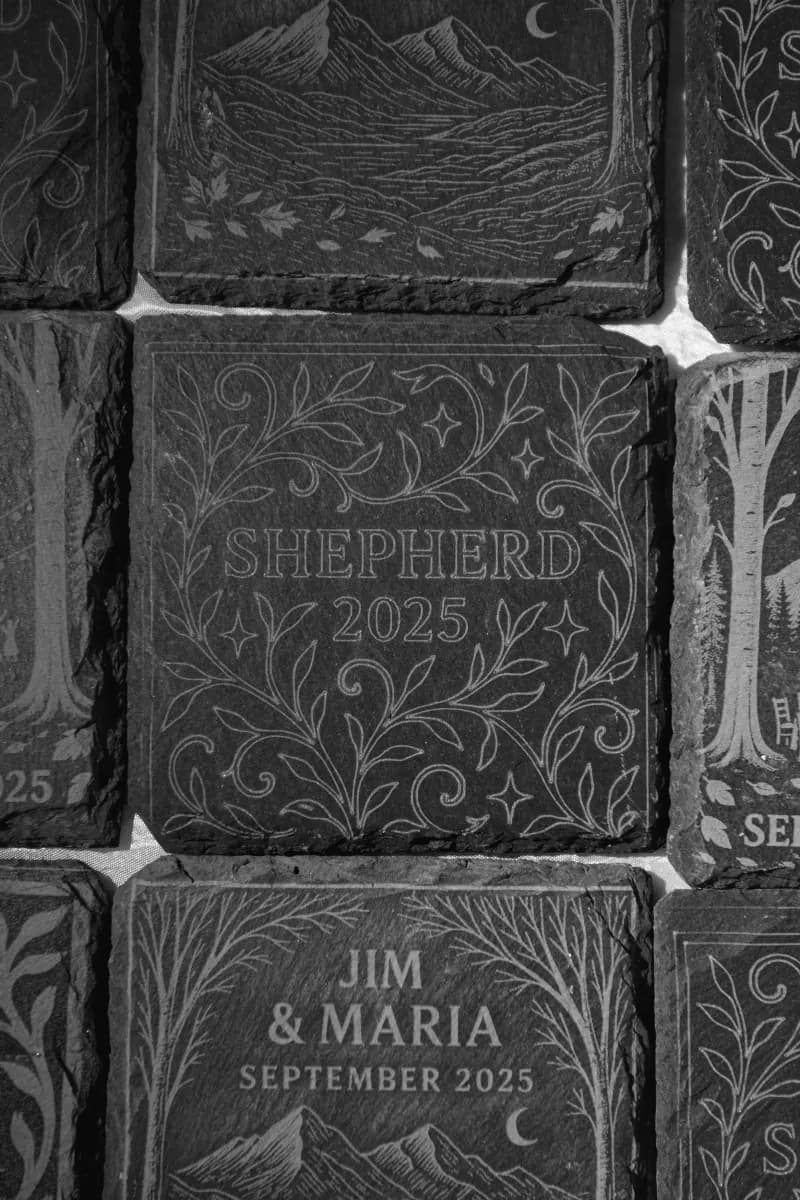 Personalized slate coasters engraved with names and date