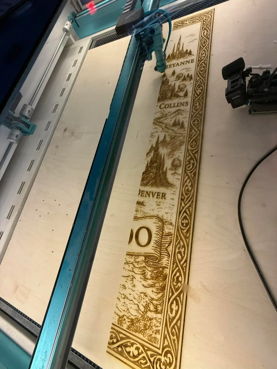 Large Colorado cornhole board being laser engraved